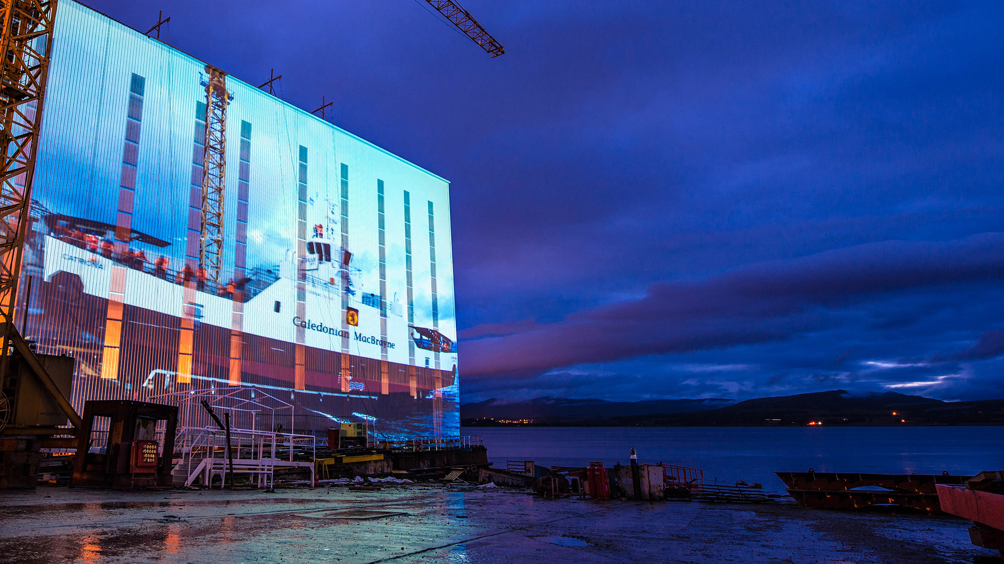Calmac timelapse marketing film, projection on port glasgow warehouse