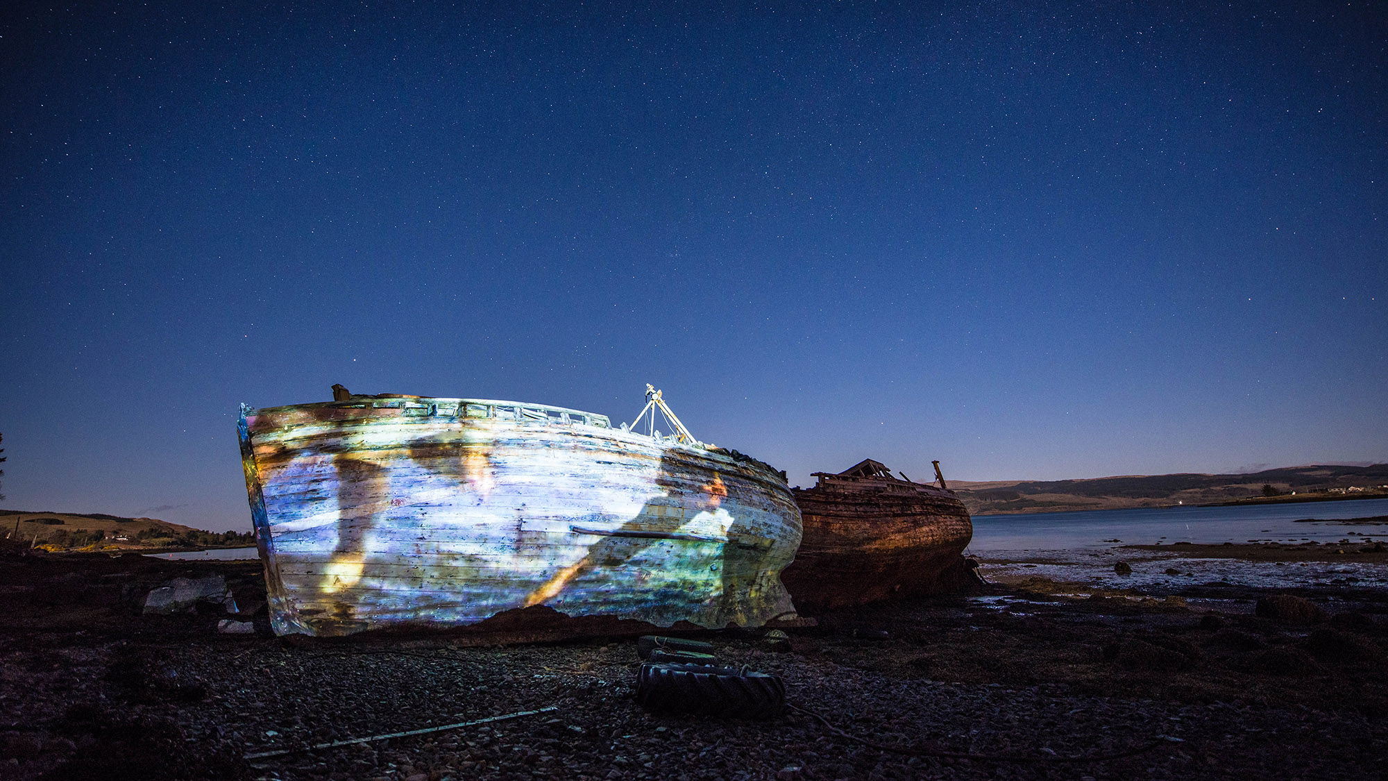 Calmac timelapse marketing film, projection on abandoned boats, Mull