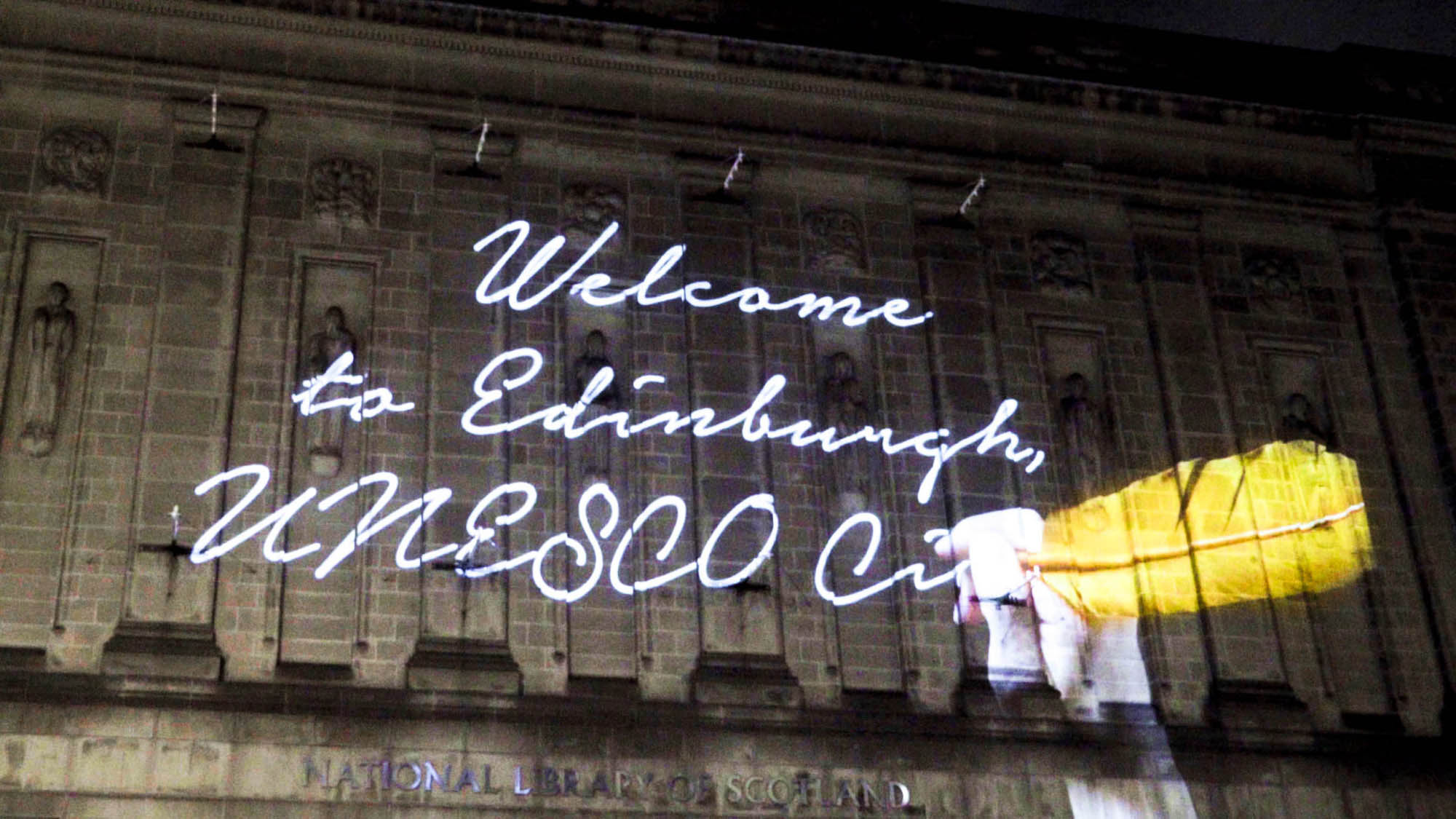 Message from the skies, projection on National Library of Scotland