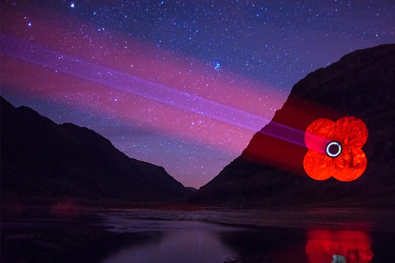 Poppy Scotland logo projected onto Mountain in Glencoe
